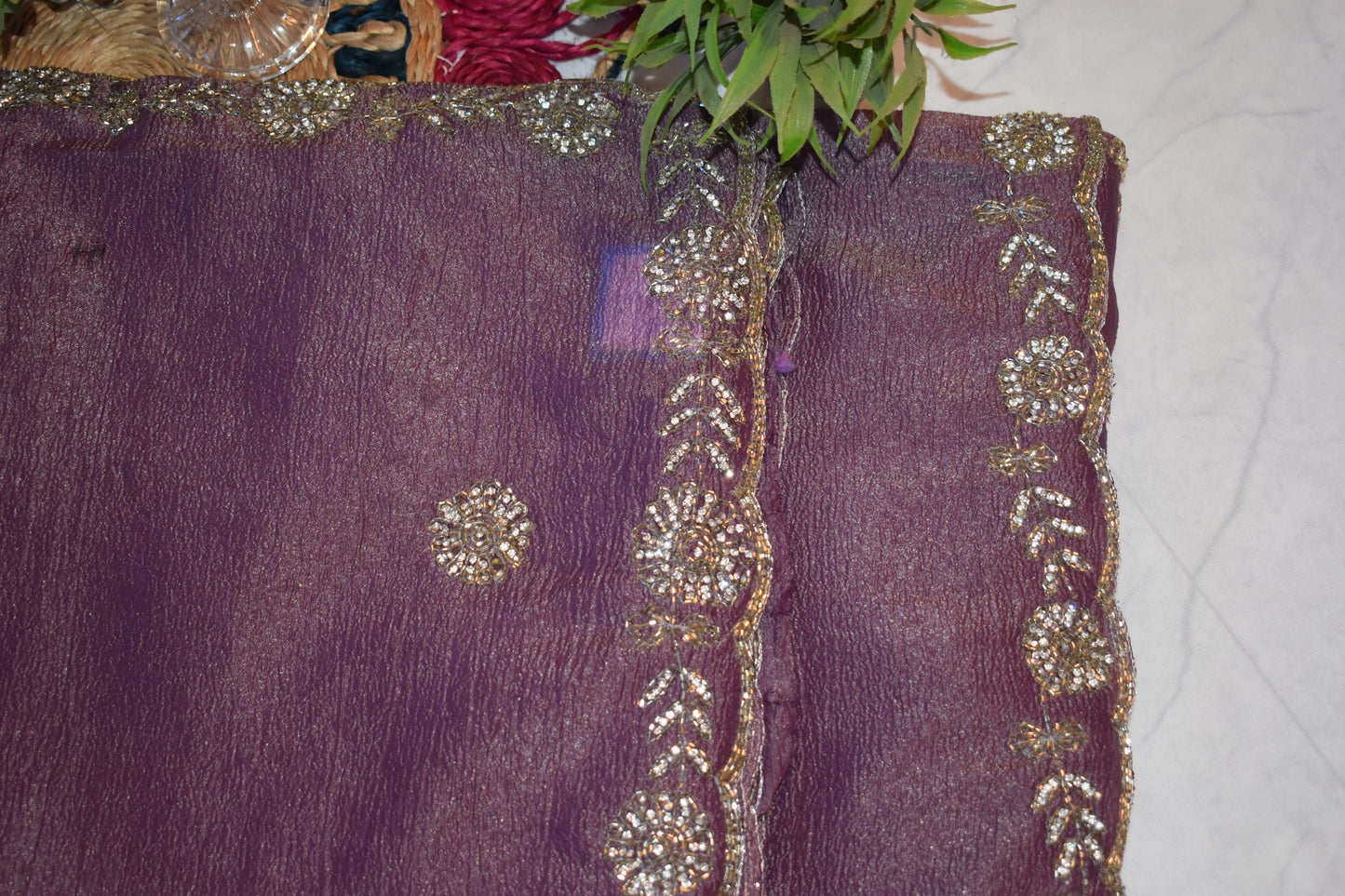 ROYAL MAUVE CRUSHED CHIFFON SAREE WITH HAND-EMBROIDERY BORDER.
