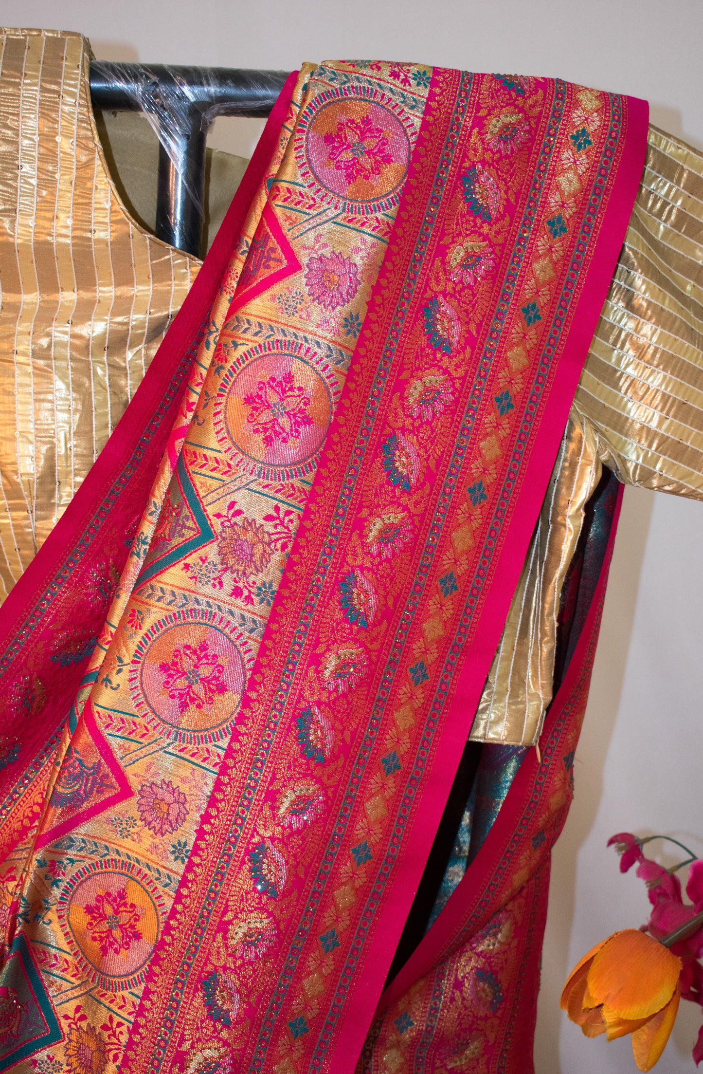 HOT PINK ART SILK SAREE WITH GOLDEN FLORAL ZARI WEAVING.