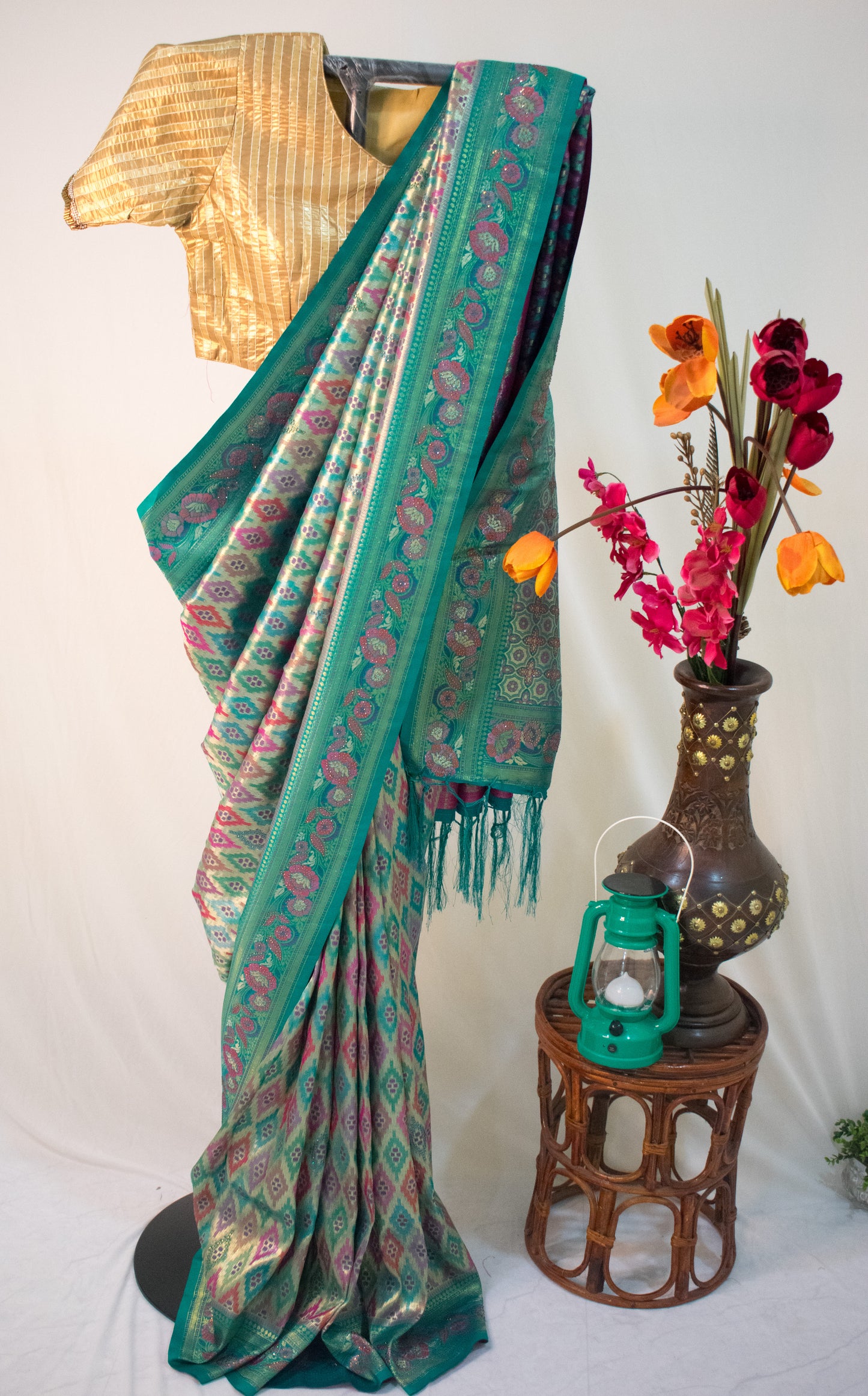 TEAL ELEGANCE – BANARASI ART SILK SAREE WITH GOLDEN ZARI & IKAT-INSPIRED MOTIFS.