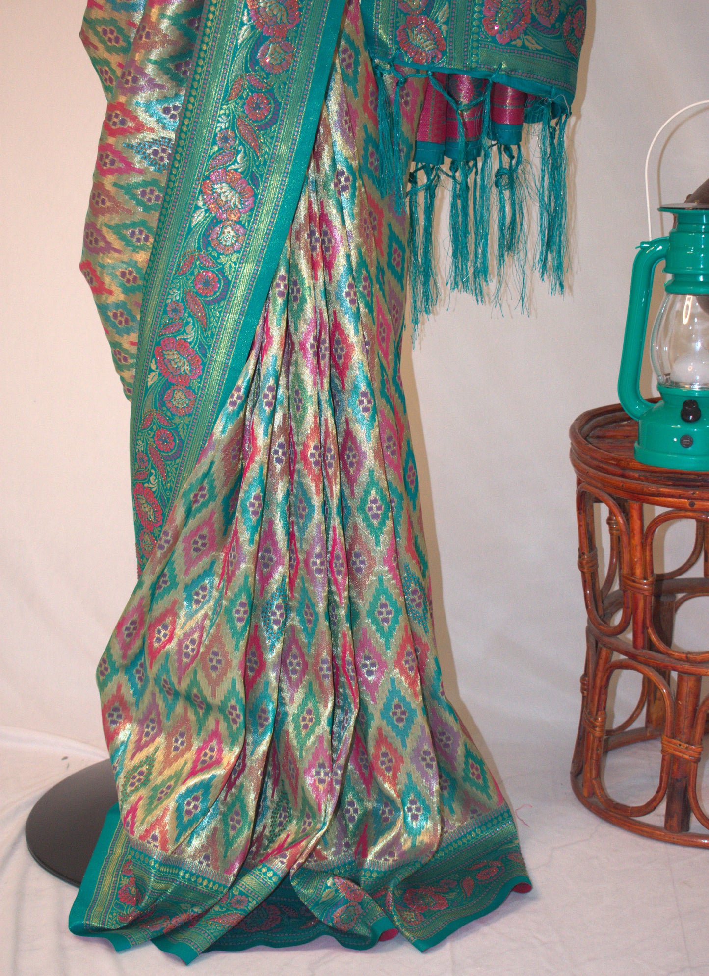 TEAL ELEGANCE – BANARASI ART SILK SAREE WITH GOLDEN ZARI & IKAT-INSPIRED MOTIFS.