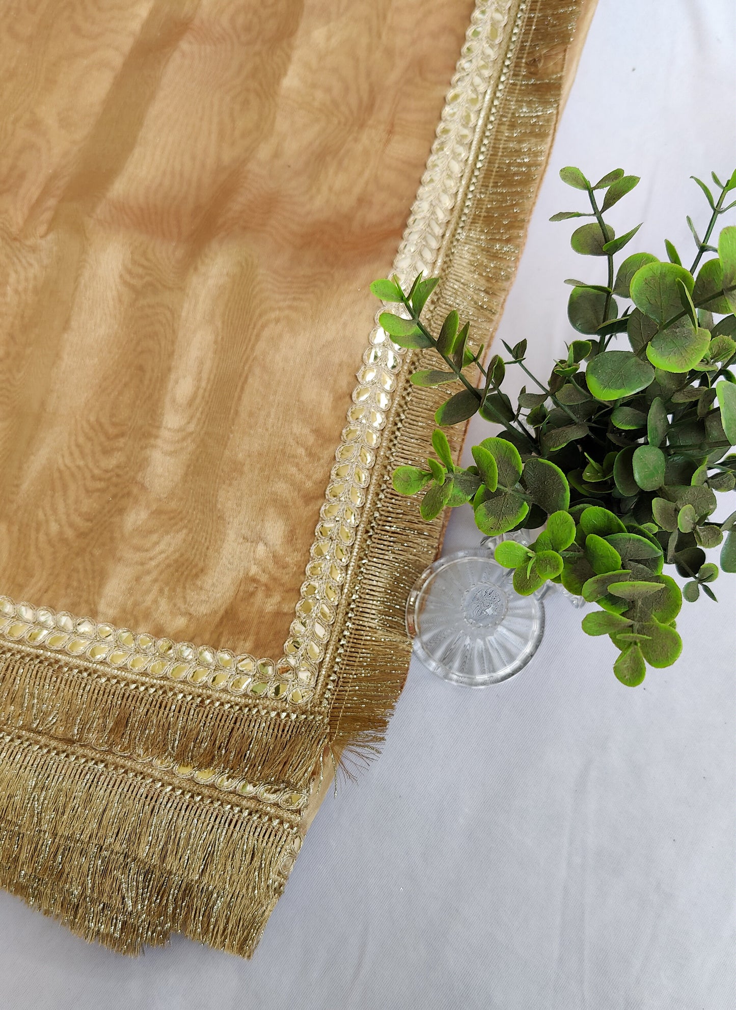PURE TISSUE GOLD SAREE WITH FRINGE DETAILING.
