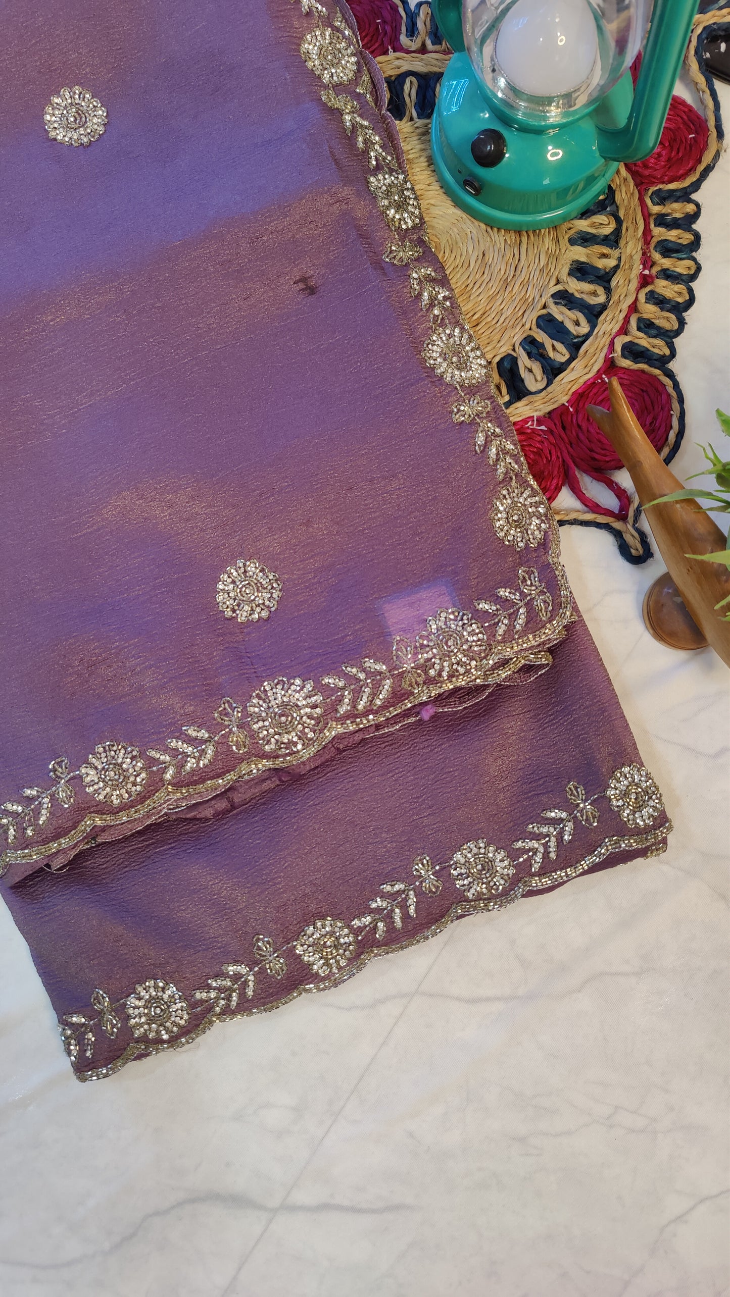 ROYAL MAUVE CRUSHED CHIFFON SAREE WITH HAND-EMBROIDERY BORDER.
