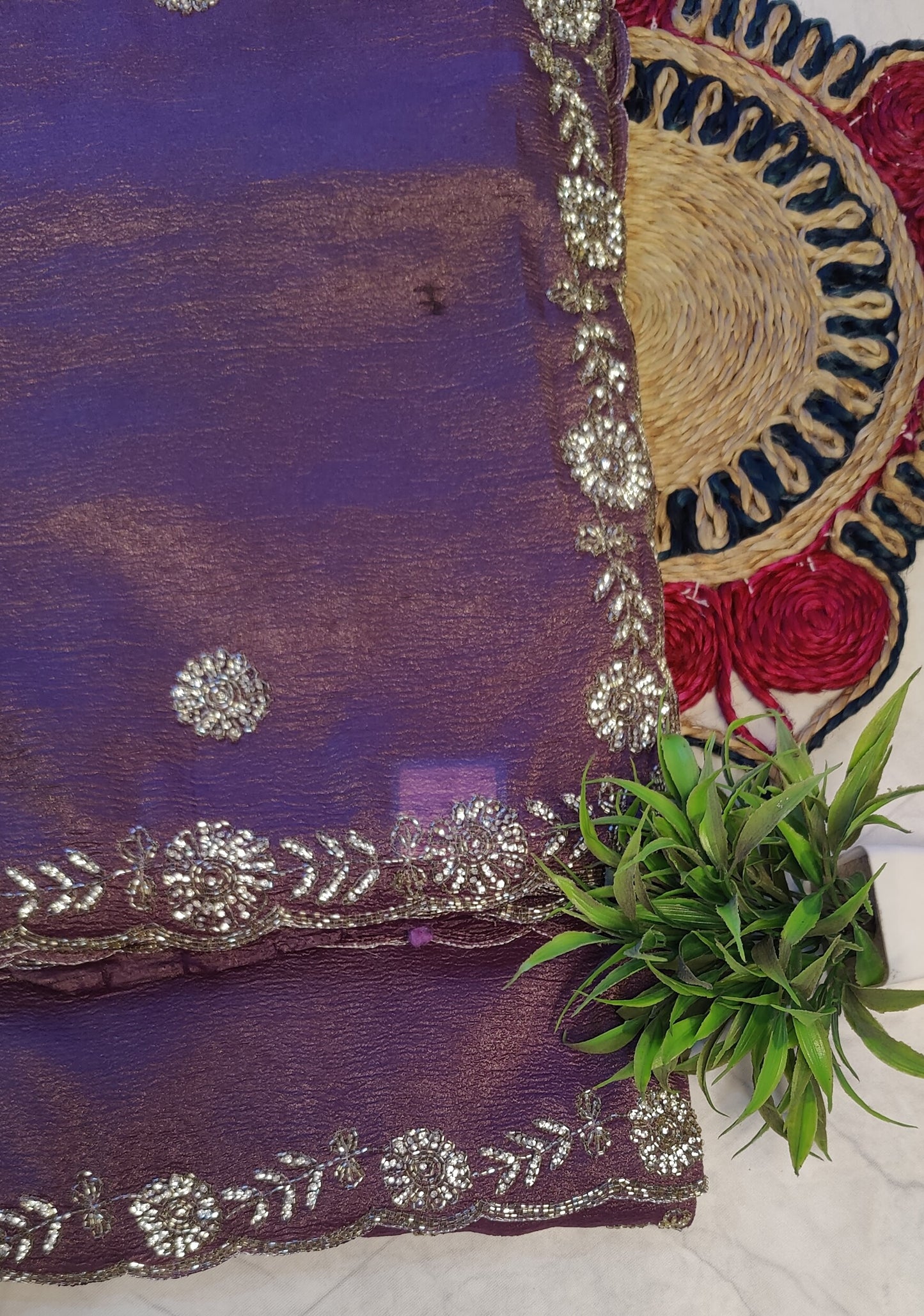 ROYAL MAUVE CRUSHED CHIFFON SAREE WITH HAND-EMBROIDERY BORDER.