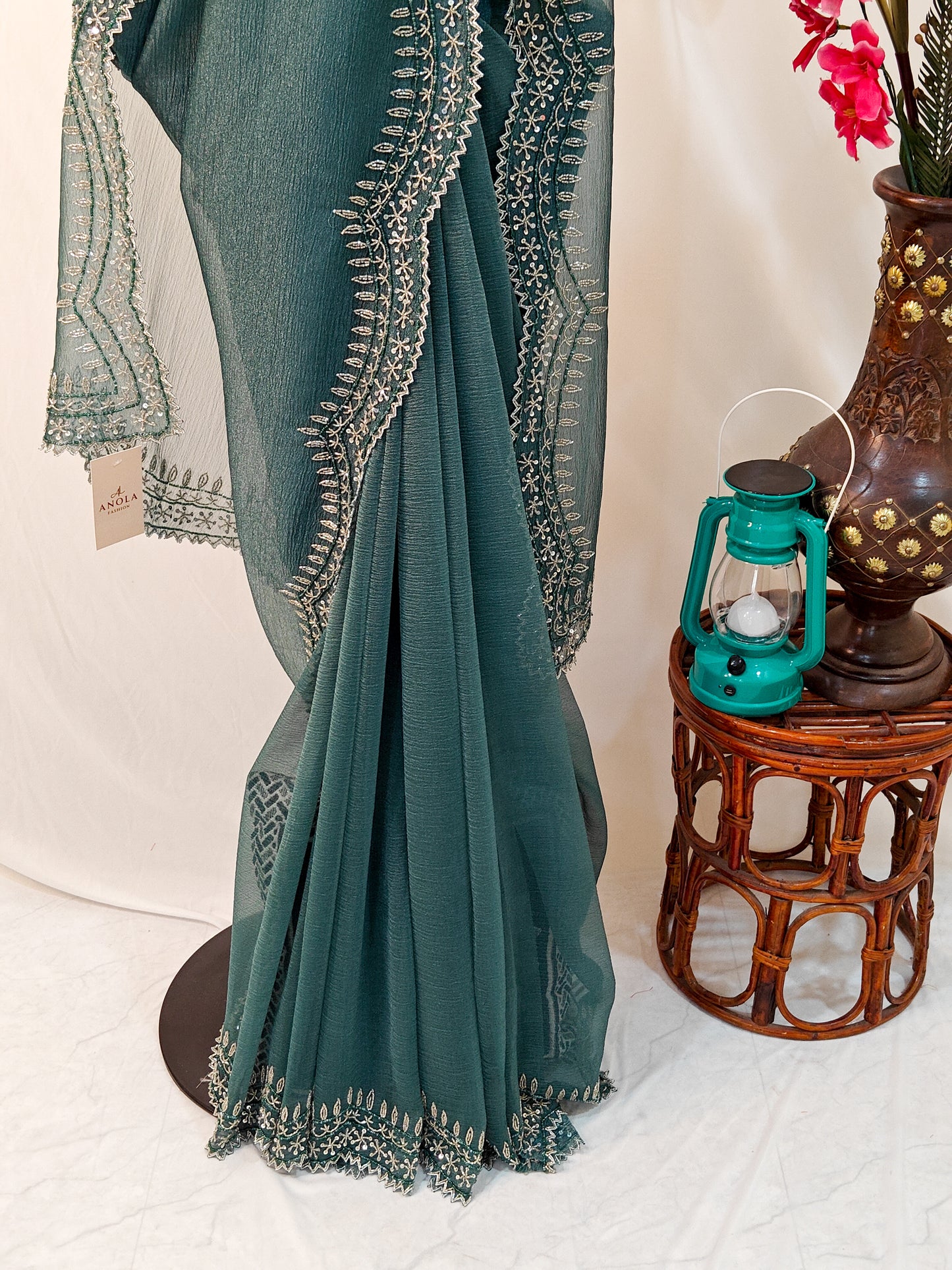 DARK GREY CRUSHED CHIFFON SAREE WITH HAND EMBROIDERED BORDER.