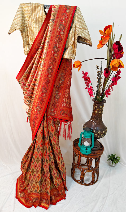 RED ART SILK SAREE WITH GOLDEN ZARI & IKAT- INSPIRED MOTIFS.