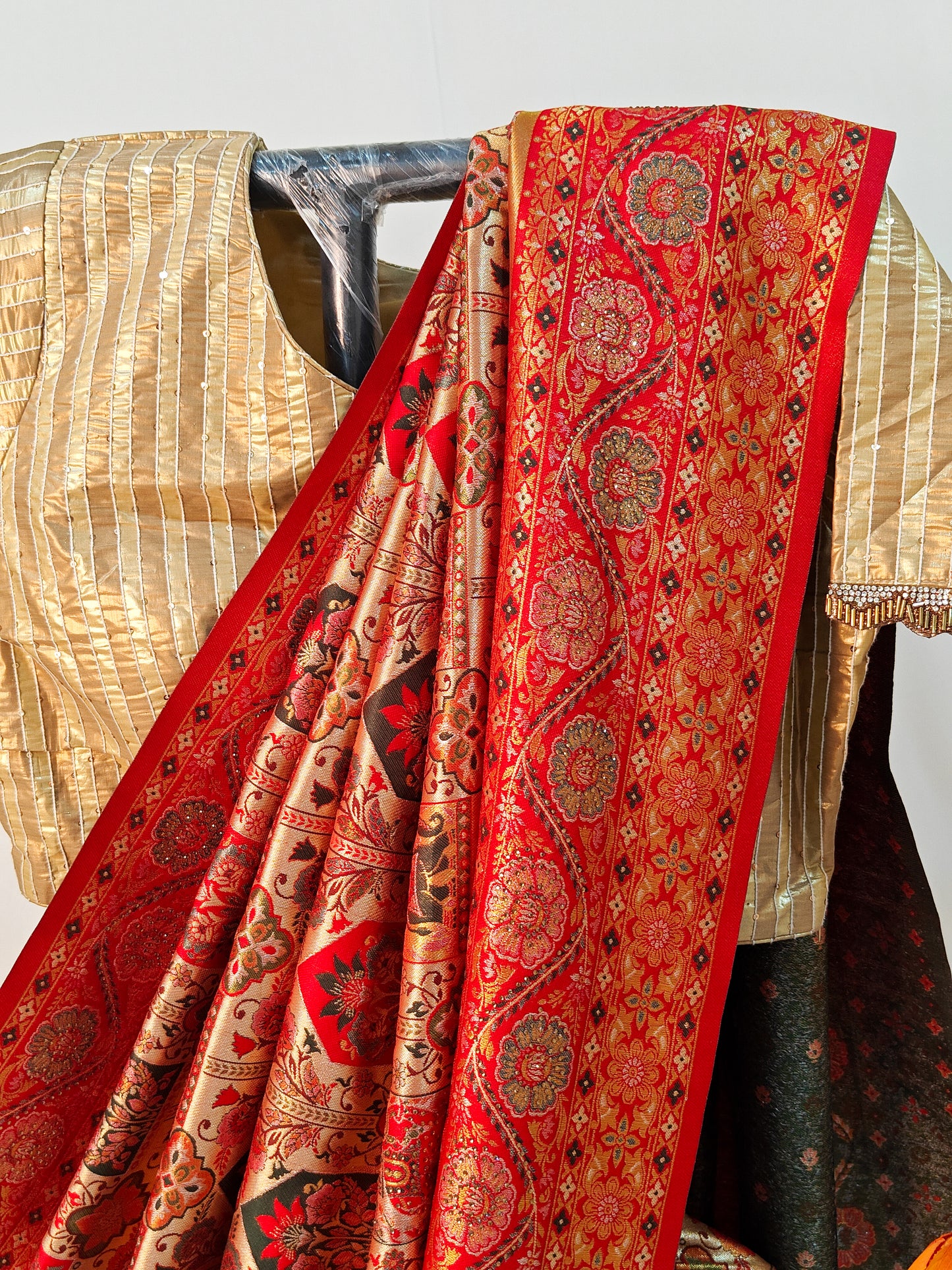 RED ART SILK SAREE WITH GOLDEN ZARI TEMPLE & ELEPHANT MOTIFS.