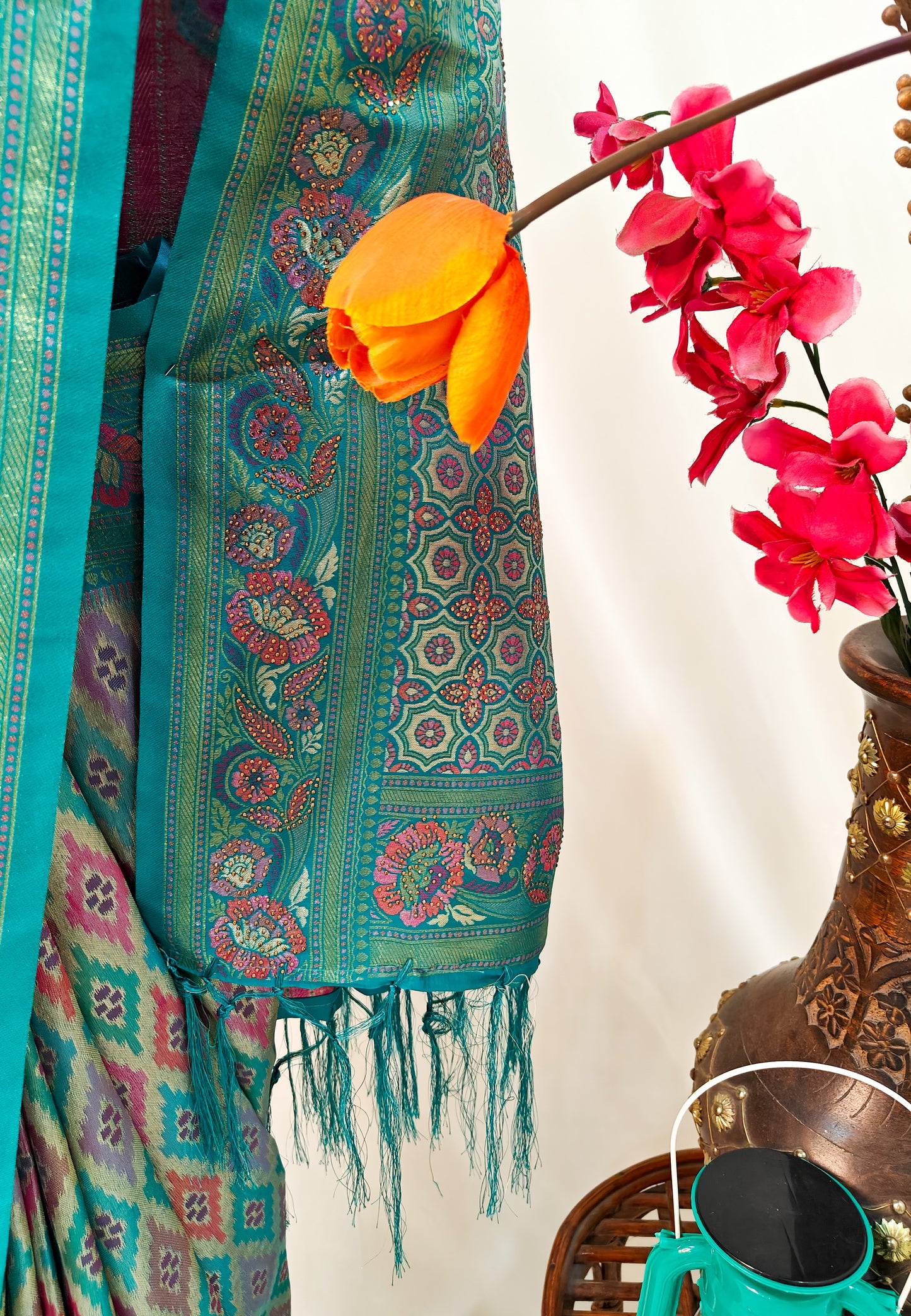 TEAL ELEGANCE – BANARASI ART SILK SAREE WITH GOLDEN ZARI & IKAT-INSPIRED MOTIFS.