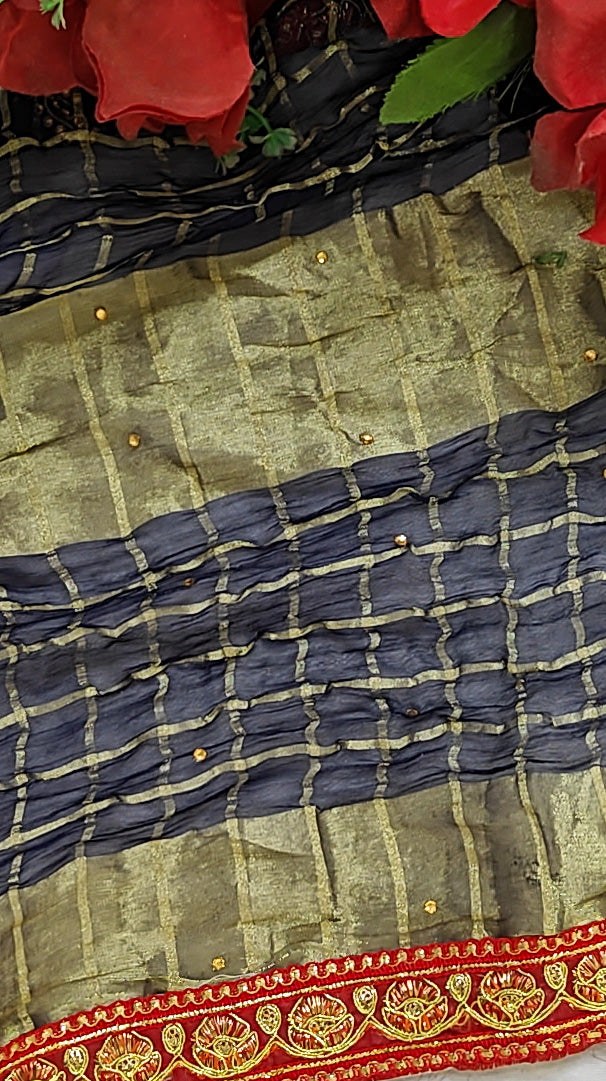 NAVY BLUE CRUSHED GEORGETTE BANDHANI SAREE WITH RED ZARI BORDER.