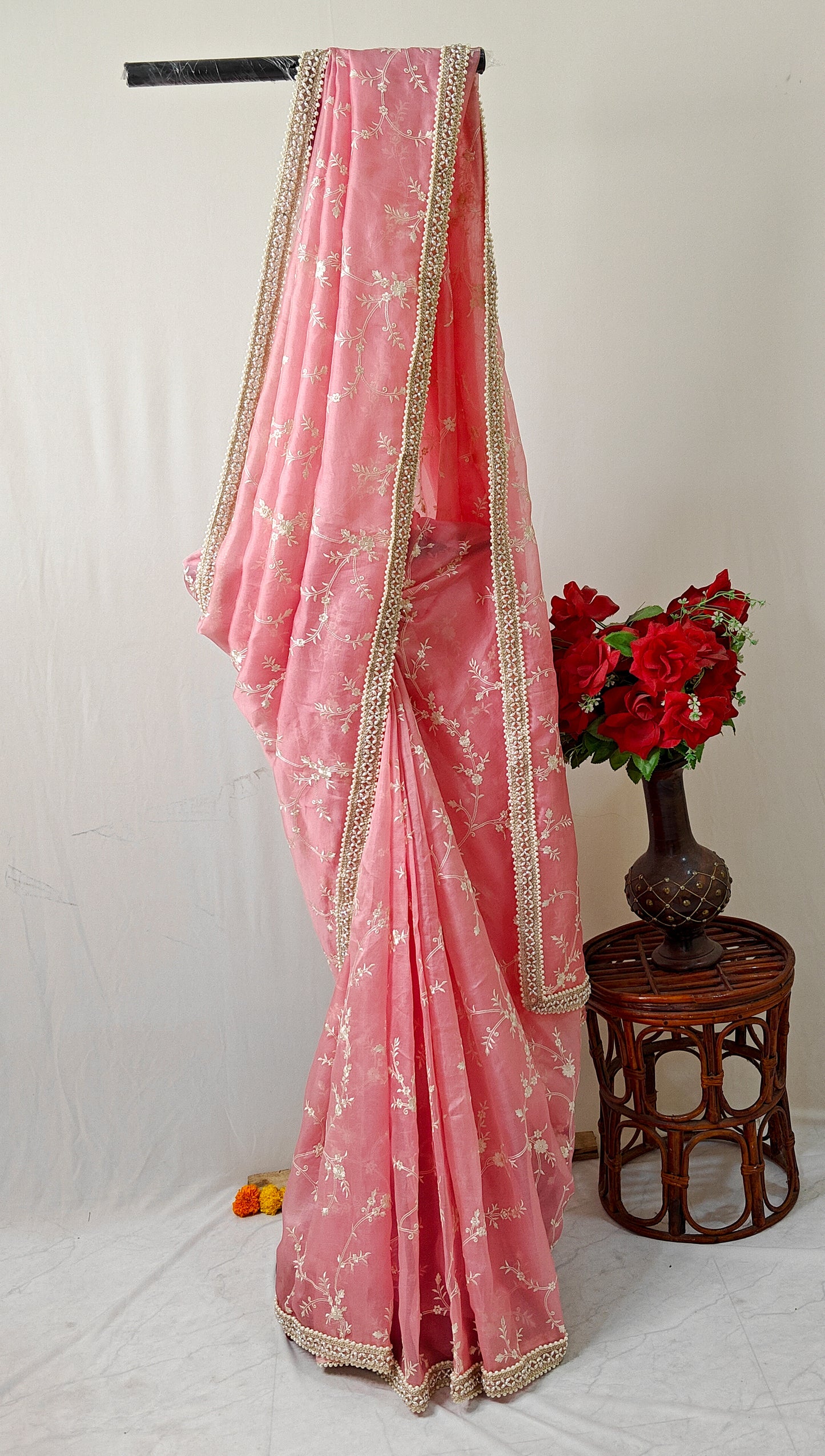 BABY PINK  PURE ORGANZA SAREE ADORNED WITH OFF-WHITE EMBROIDERY & PEARL EMBELLISHED BORDER.