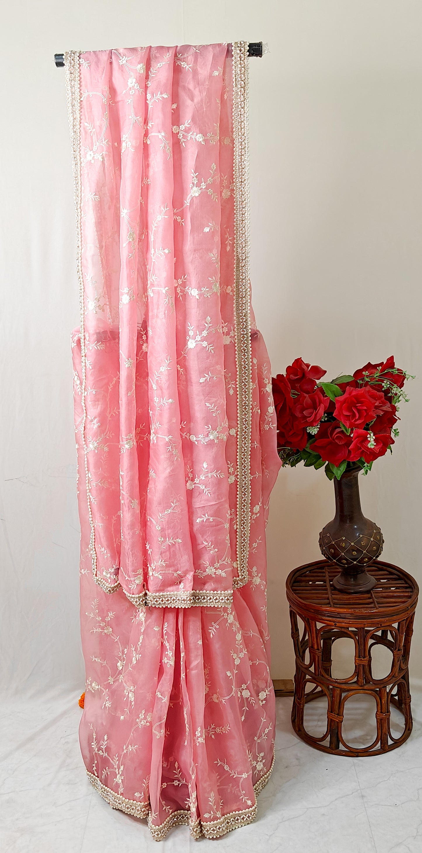 BABY PINK  PURE ORGANZA SAREE ADORNED WITH OFF-WHITE EMBROIDERY & PEARL EMBELLISHED BORDER.