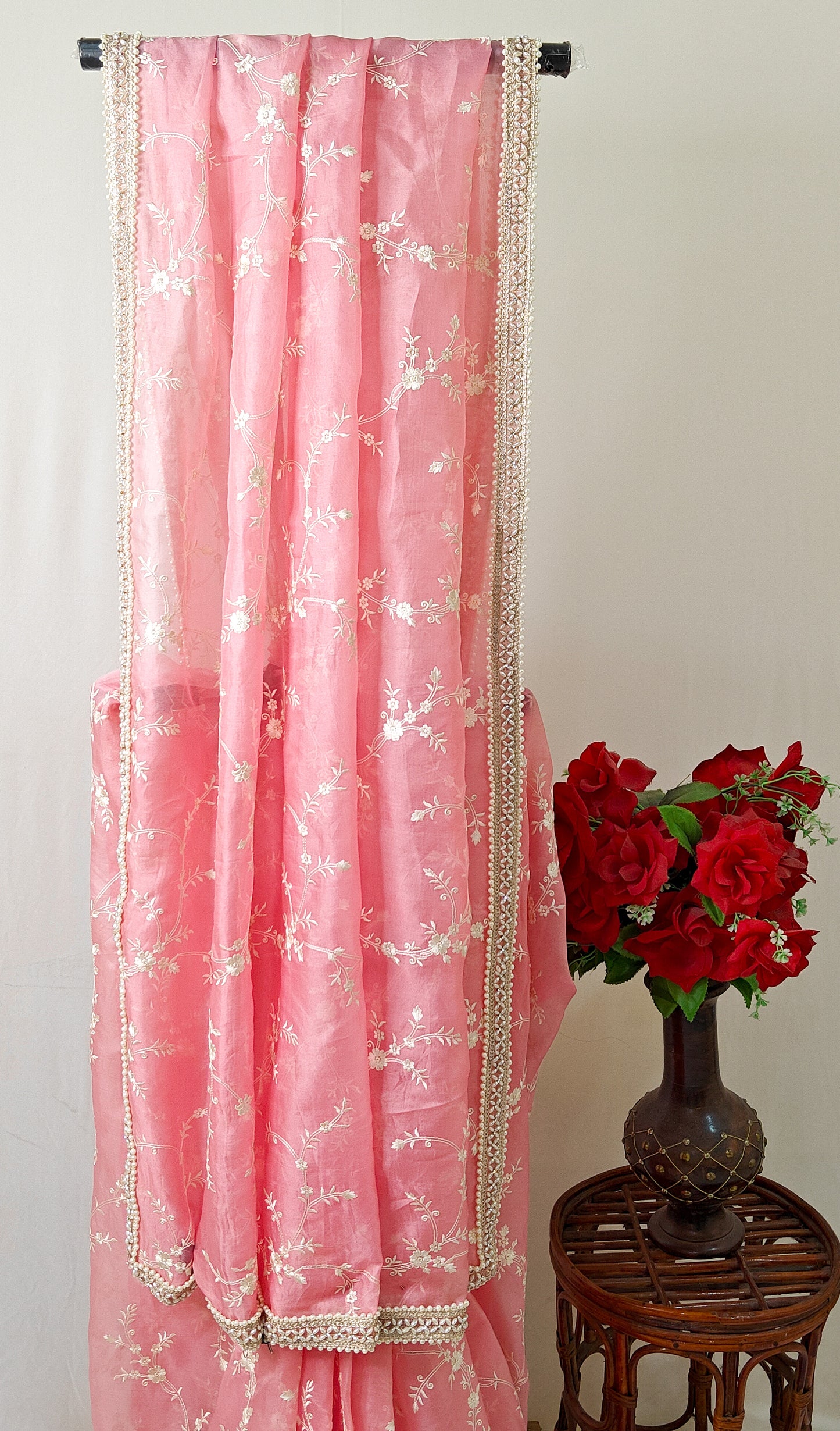 BABY PINK  PURE ORGANZA SAREE ADORNED WITH OFF-WHITE EMBROIDERY & PEARL EMBELLISHED BORDER.