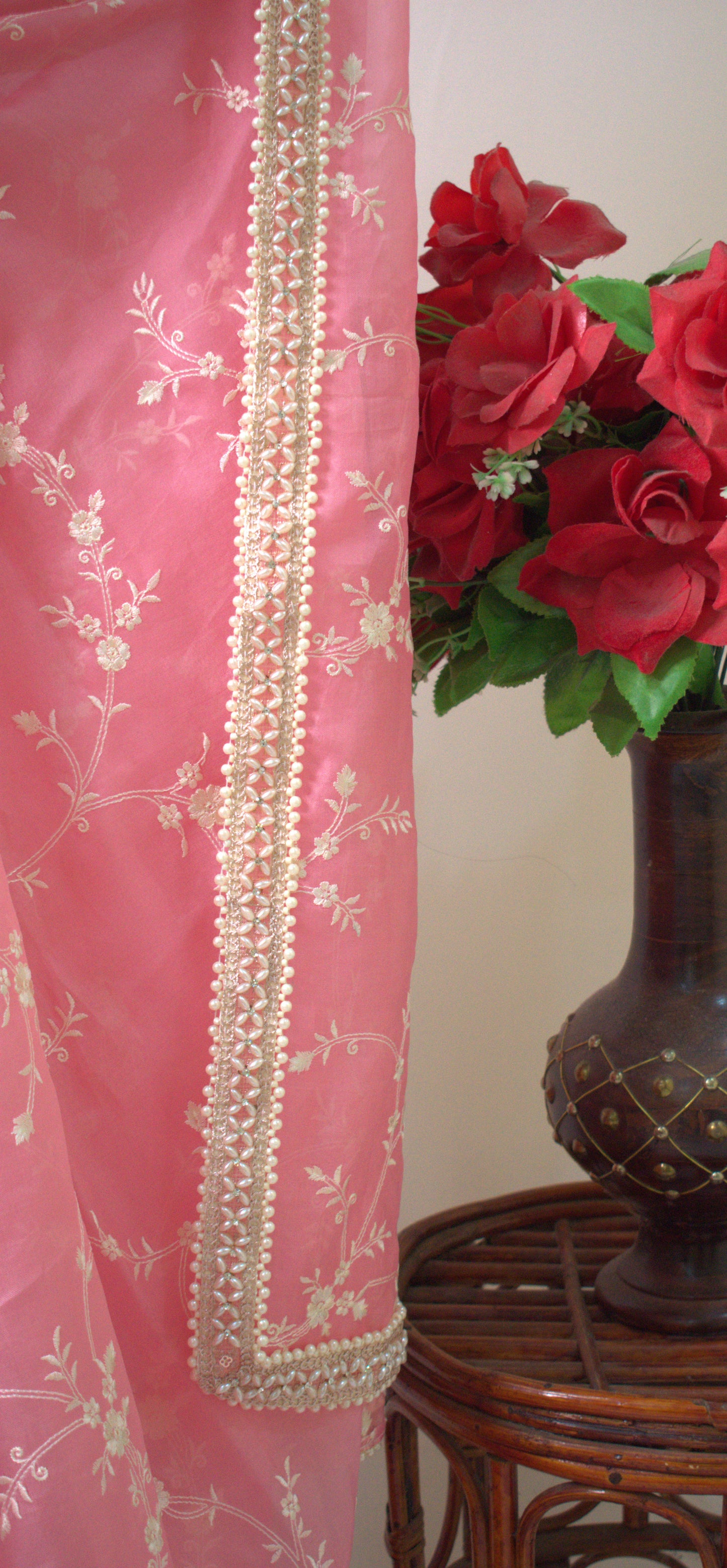 BABY PINK  PURE ORGANZA SAREE ADORNED WITH OFF-WHITE EMBROIDERY & PEARL EMBELLISHED BORDER.