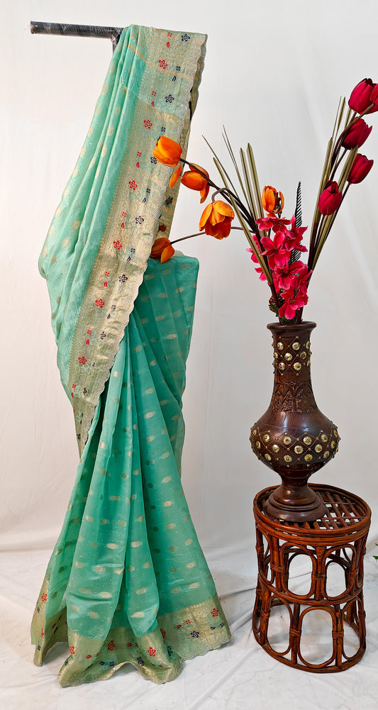 SEA GREEN SILK BLEND SAREE WITH ZARI, FLORAL BORDER & SWAROVSKI WORK.