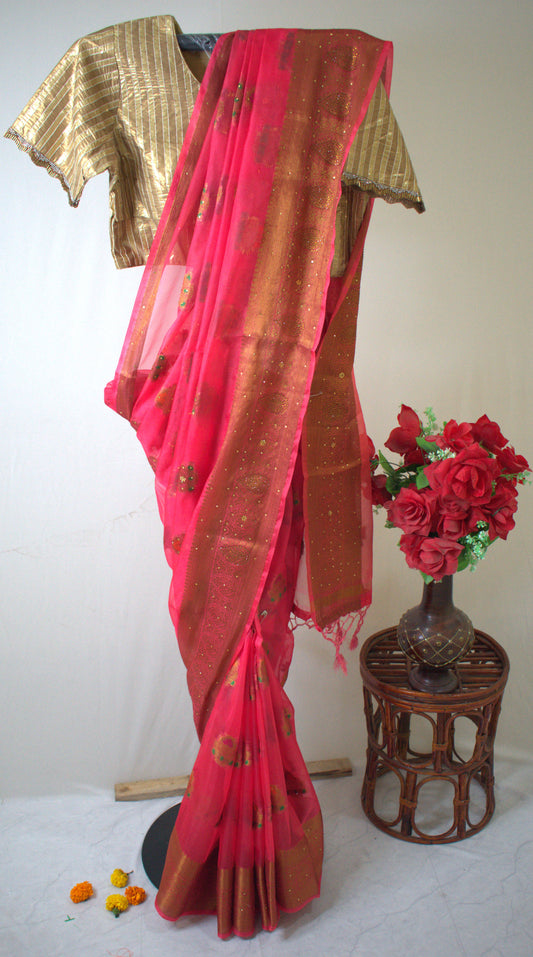 CRIMSON PINK ORGANZA SILK SAREE WITH ZARI WEAVE & BEAD DETAILING.