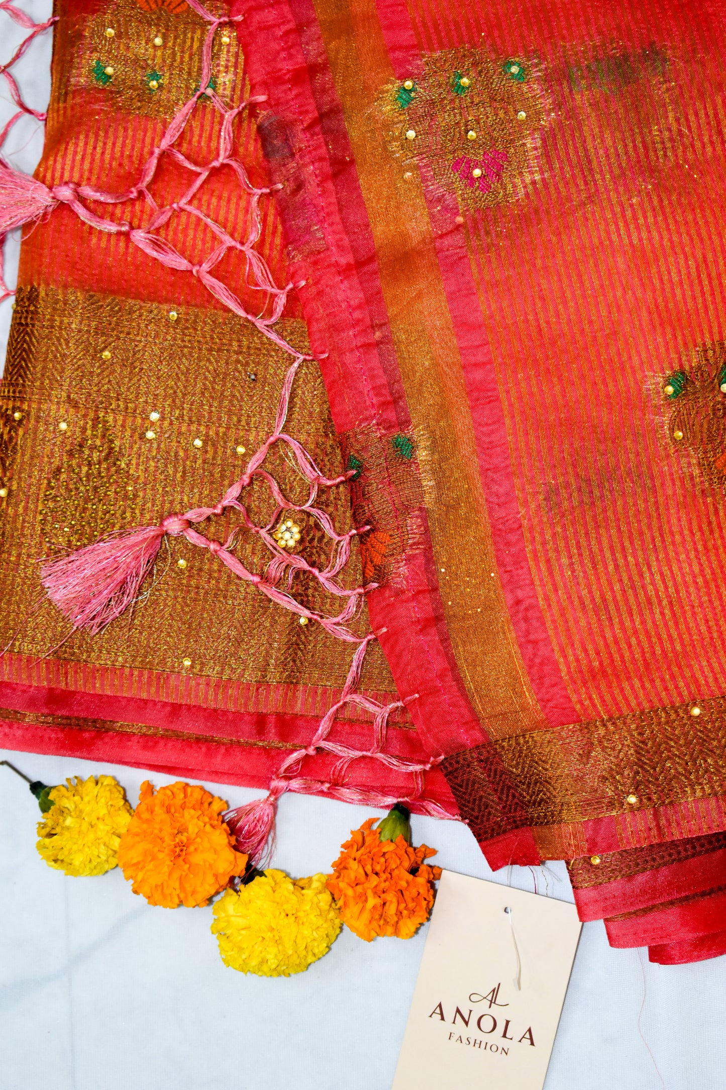 CRIMSON PINK ORGANZA SILK SAREE WITH ZARI WEAVE & BEAD DETAILING.