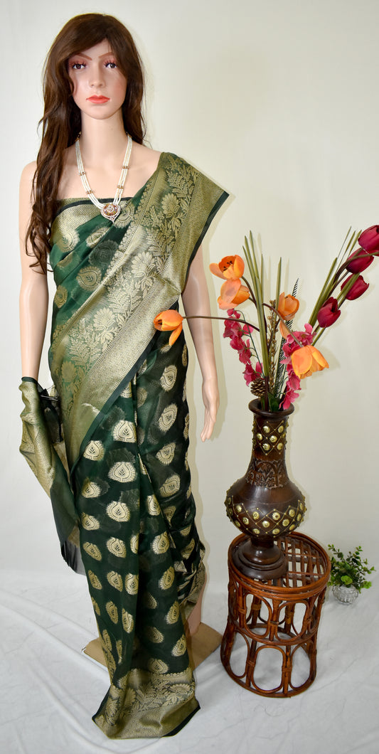 DARK BOTTLE GREEN SILK BLEND SAREE WITH INTRICATE GOLDEN ZARI WEAVING.