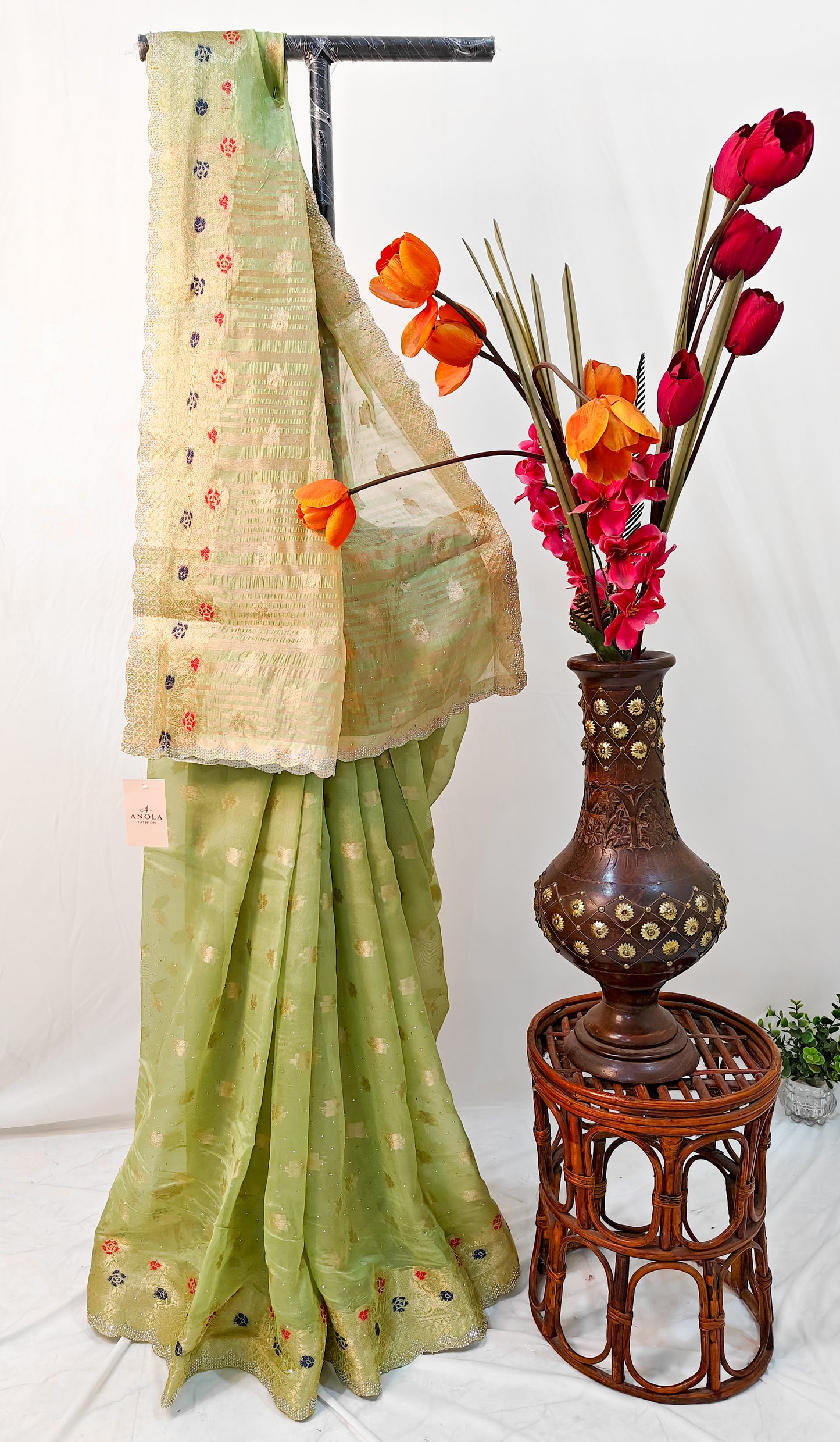 PARROT GREEN SILK BLEND SAREE WITH ZARI FLORAL BORDER & SWAROVSKI DETAILING.
