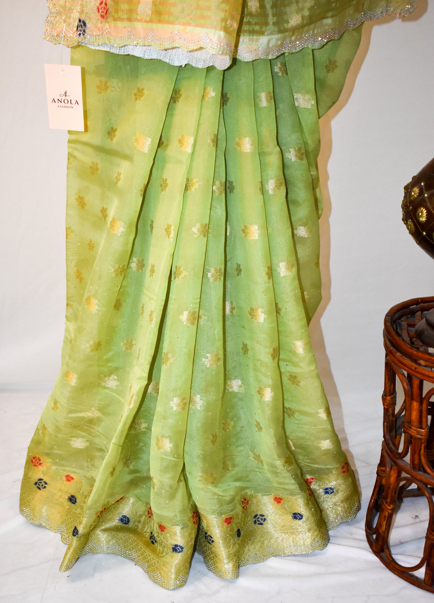 PARROT GREEN SILK BLEND SAREE WITH ZARI FLORAL BORDER & SWAROVSKI DETAILING.