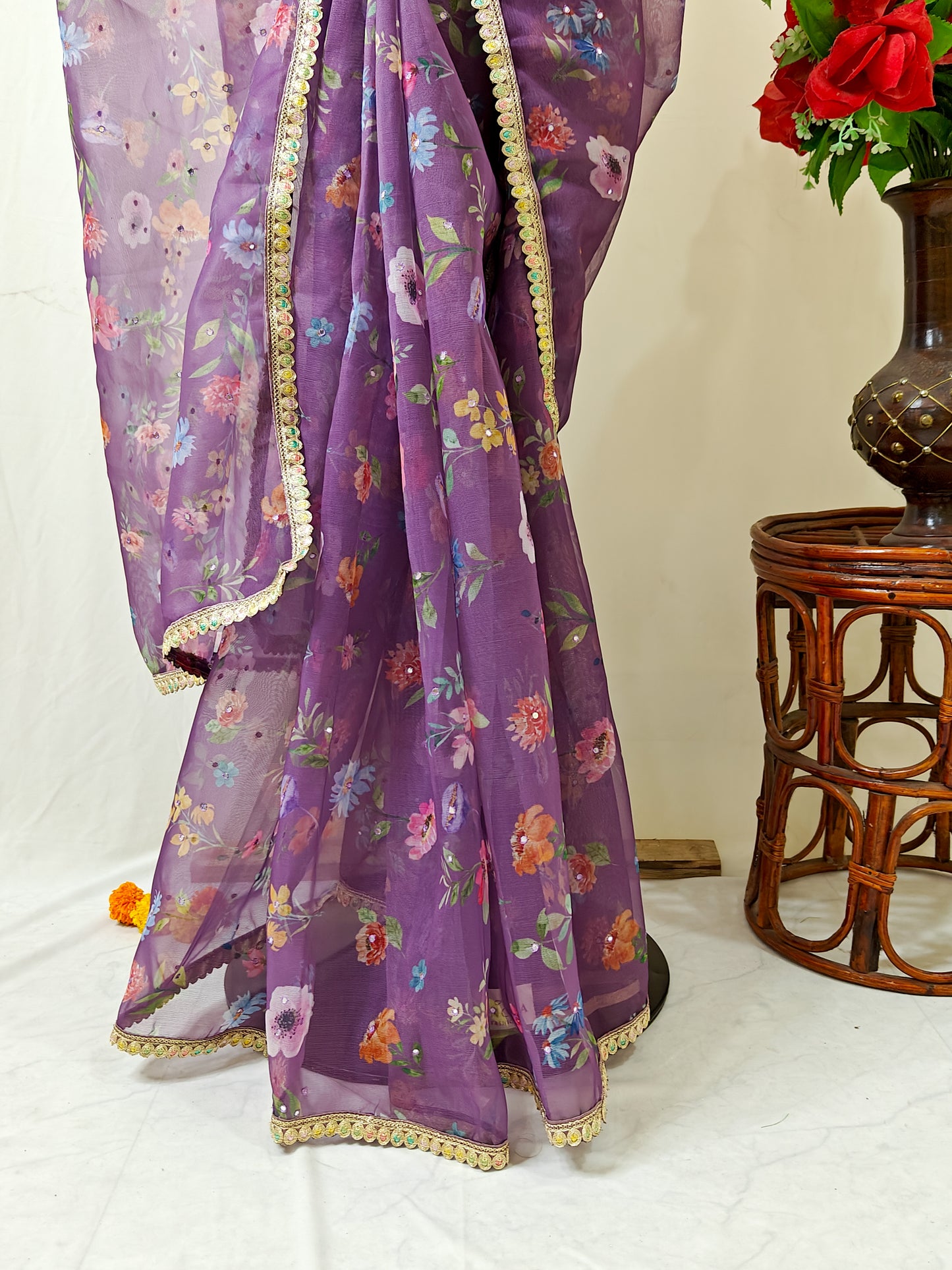 PURPLE ORGANZA FLORAL PRINT SAREE WITH MULTICOLOUR SEQUIN BORDER.