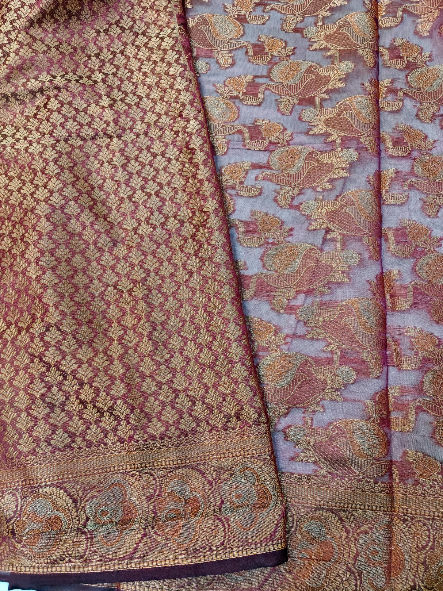 DARK PURPLE SILK BLEND SAREE WITH INTRICATE GOLDEN ZARI WEAVING.