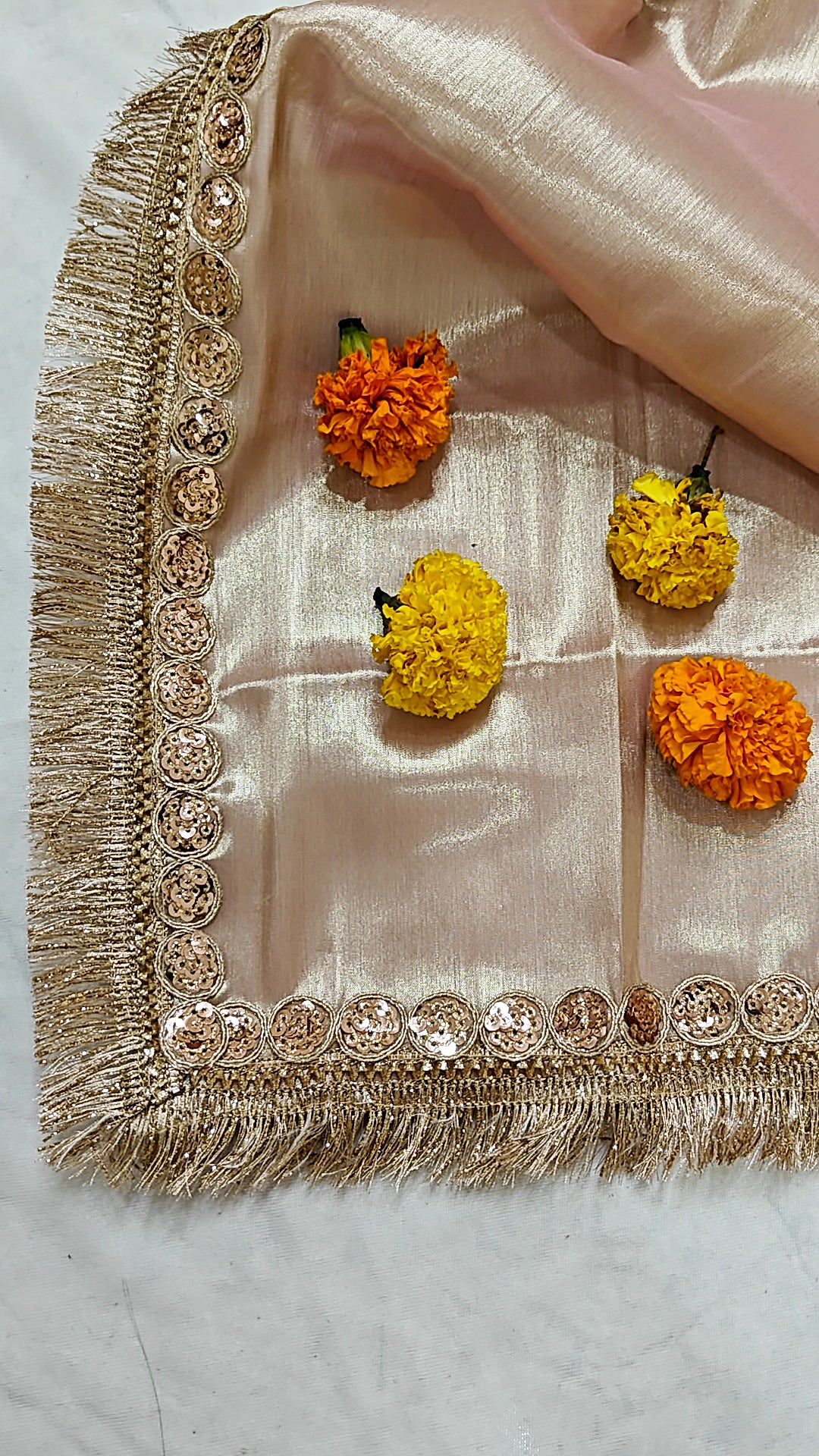 PURE TISSUE ROSE GOLD SAREE WITH ROSE GOLD SEQUIN & FRINGE DETAILING.