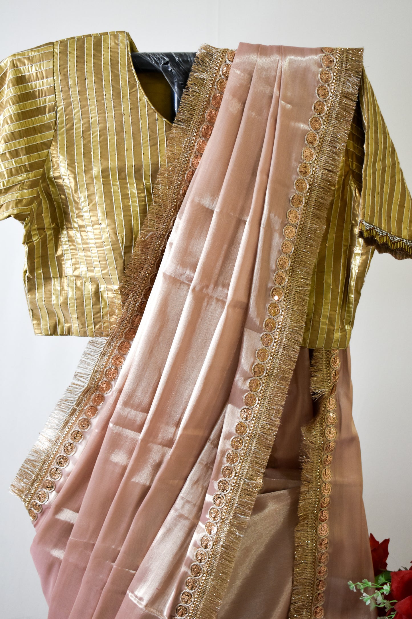 PURE TISSUE ROSE GOLD SAREE WITH ROSE GOLD SEQUIN & FRINGE DETAILING.